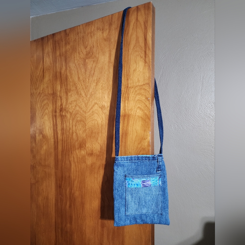 Chic Denim Crossbody Bag with Blue Accents